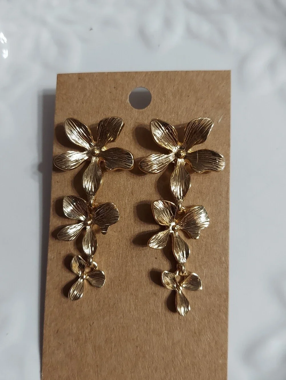 Textured Gold Tone/Dogwood Flower Trio Drop Earrings